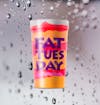 Orange and pink striped Fat Tuesday drink